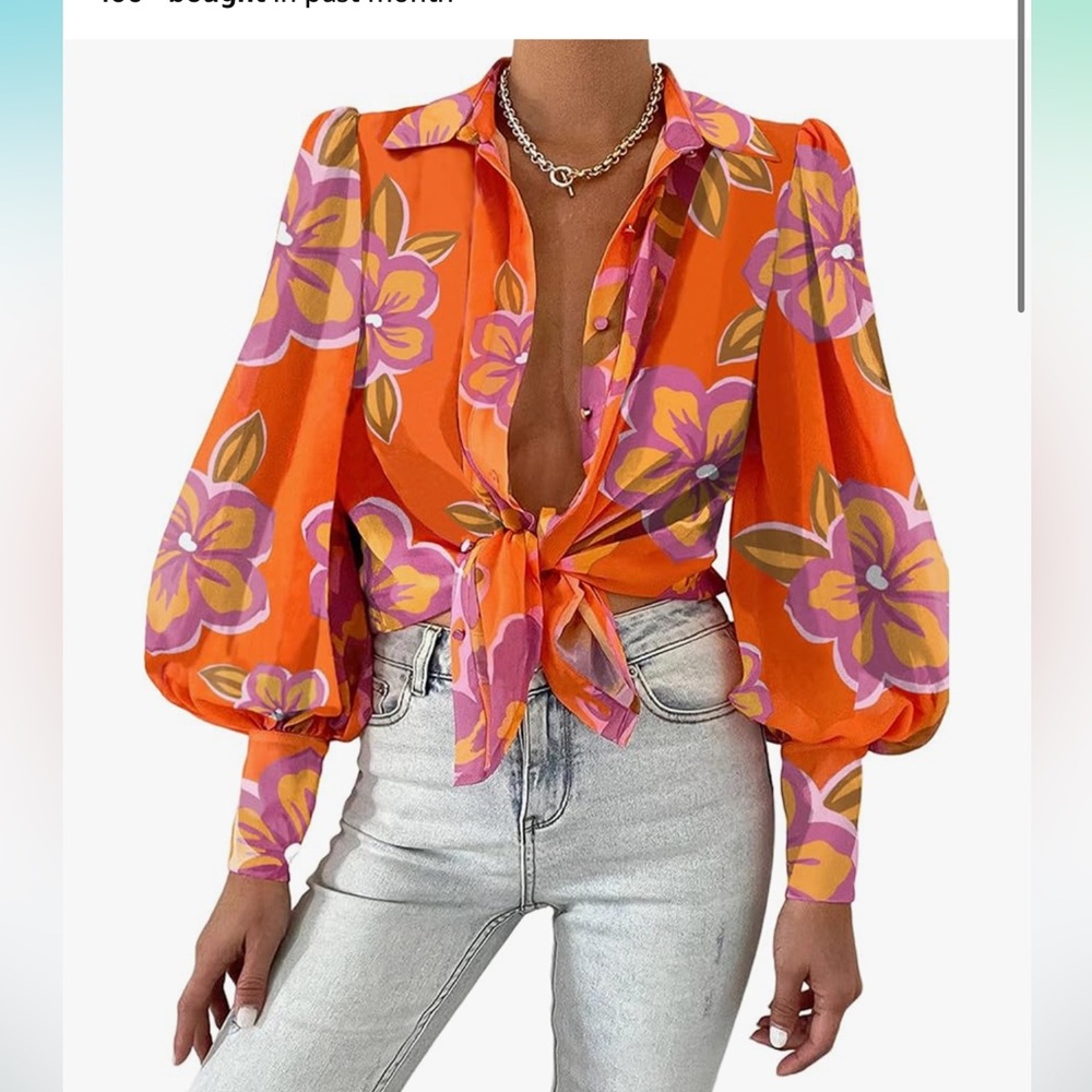 NWOT Women’s bright blouse. Size Large.